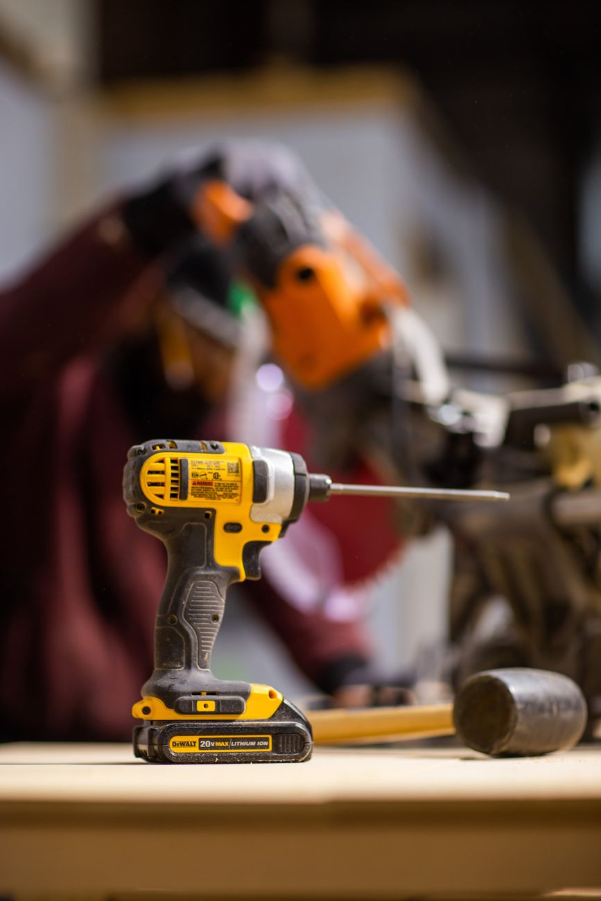 Cordless drill on a workshop bench